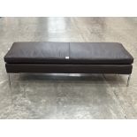 A Camerich of London contemporary style leather stool. 58" wide.