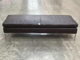 A Camerich of London contemporary style leather stool. 58" wide.