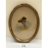 A late 19th century portrait miniature of a lady. The oval frame 8½" high.