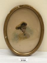 A late 19th century portrait miniature of a lady. The oval frame 8½" high.