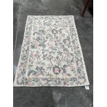 A Kashmiri wool stitched chain rug. 1.58m x 1.1m.