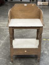 A Victorian pine washstand with base drawer. 24" wide.