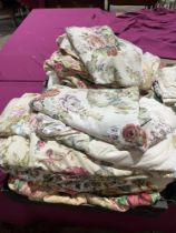 Three boxes of Sanderson print curtains and other textiles