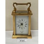 A gilt brass carriage timepiece signed Bornand Freres, Bicester. 4" high.