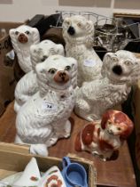 Six 19th century Staffordshire spaniels.