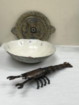 A glazed studio bowl, a pottery tray and a metal lobster.