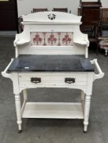 A late Victorian painted washstand. 30" wide.