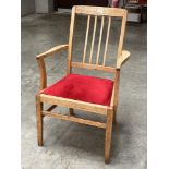 A 20th century oak armchair.