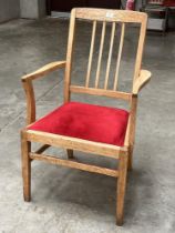 A 20th century oak armchair.