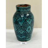 A Persian glazed earthenware ovoid vase. Late 19th or early 20th century. 8¾" high.