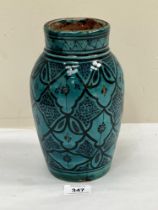 A Persian glazed earthenware ovoid vase. Late 19th or early 20th century. 8¾" high.