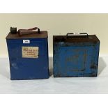 A vintage petrol can and an Esso Blue Paraffin can