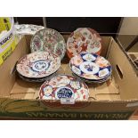Eight Imari plates and a Chinese famille-rose plate