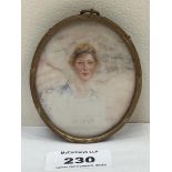 A 19th century portrait miniature of a young lady. Signed Paul de Guise. The gilt reeded frame.