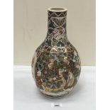 A Japanese satsuma decorated baluster vase. 12½" high.