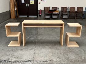 A modernist design side table with a pair of occasional tables. (3)