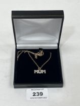 A 9ct 'MUM' pendant and necklet chain. 4.1g gross.