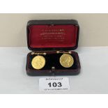 A pair of 22ct South African ½ pond coins mounted as cufflinks. The chain and dumbells 15ct. 14.9g