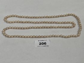 A necklace of knotted pearls. 34" long.