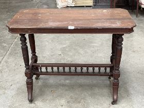 A Victorian mahogany side table. 35" wide.