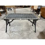 A metal garden table. 45" wide