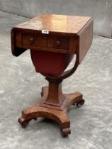 A George IV burr oak drop leaf work table with one real drawer and blind drawer, over a sliding