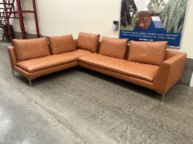 A Camerich of London contemporary style tan leather corner sofa in two parts. Each part 89" wide.