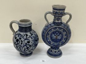 A German stoneware pitcher and a moon flask. 15" high and smaller.