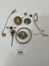 A collection of antique and later unmarked yellow metal jewellery.