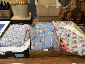 Three boxes of textiles, including 1970s Laura Ashley.