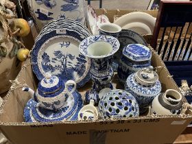 A box of blue and white ceramics