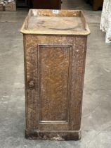 A Victorian maple veneered pot cupboard. Distressed.