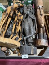 A box of carved wood figures