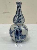 A Chinese blue and white decorated double gourd vase. Four figure character mark. 8" high.