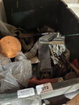 A box of tools and metalware.