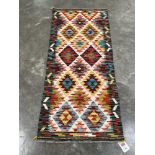 A Chobi Kilim runner. 1.5m x 0.64m