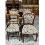 A set of three Victorian dining chairs and another chair.