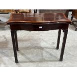 A 19th century mahogany and crossbanded serpentine card table with small drawer to the back panel,