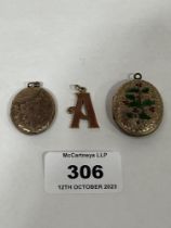 A 9ct 'A' pendant, 2g and two lockets. (A.F.)