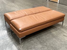 A pair of Camerich of London contemporary style tan leather stools. 58" wide.