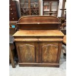 A Victorian mahogany chiffonier with raised back. 42" wide.