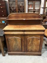 A Victorian mahogany chiffonier with raised back. 42" wide.