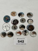 Sixteen button tops decorated in enamels with dogs or horses.