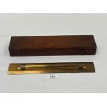 An early 20th century gilt brass draughtsman's rule. Boxed 12" long.