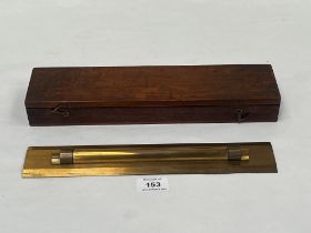 An early 20th century gilt brass draughtsman's rule. Boxed 12" long.