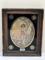 An early 19th century silk needlework, boy with flute and hound. Verro-eglomise and gilt frame. 9" x