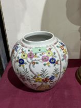 A Chinese famille-rose jar. 7" high.