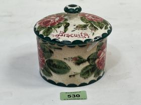 A Wemyss biscuit jar and cover, retailed by T. Goode, London. 4¼" high.