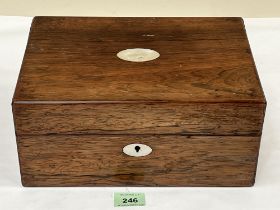 A Victorian rosewood work box. 11" wide.