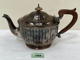 A George V silver teapot. Birmingham 1928. 16ozs 16dwts gross.